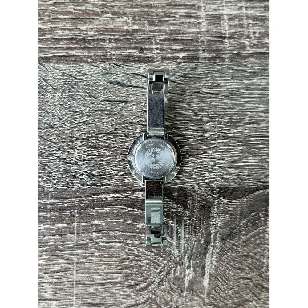 Anne Klein Silver - Toned Ceramic Bangle Ladies Wrist Watch needs  battery